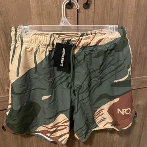 NFQ size medium shorts. Tiger stripe camo.